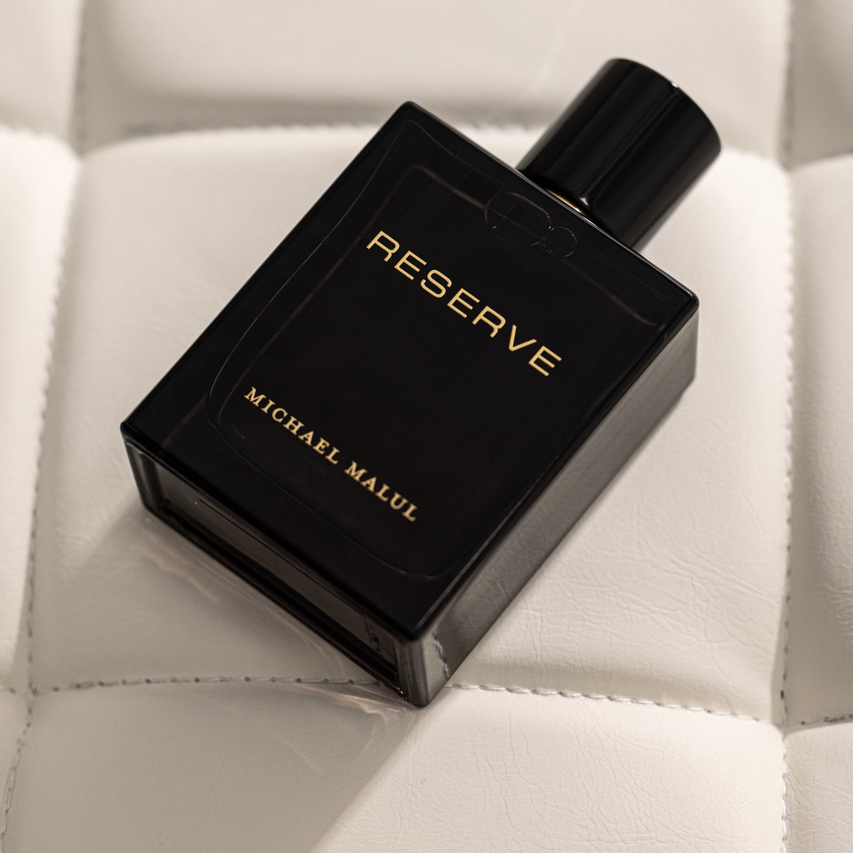 Michael Malul Jet Black Reserve fragrance notes: lavender, apple, cardamom, white pepper, amber and woods