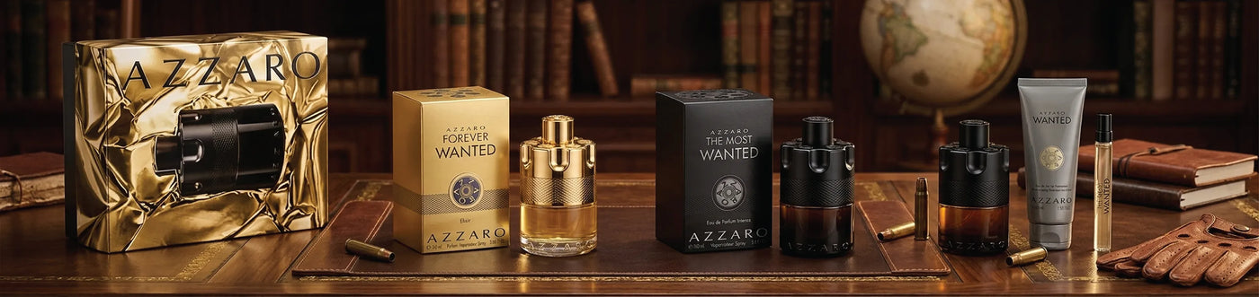 Azzaro Perfume Bottles and cases in a library table with wooden shelves, wooden desk, and a globe in the back ground. Forever Wanted, The Most Wanted, Wanted