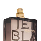 Close-up of the Michael Malul Jet Black Mahogany bottle label and wood-tone cap detailing