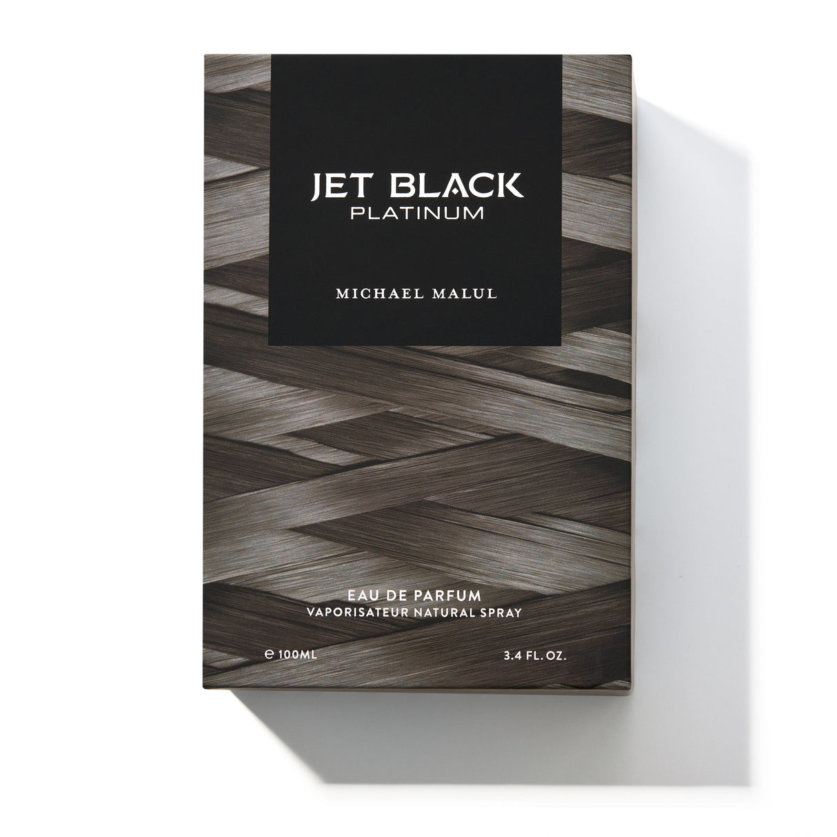 Michael Malul Jet Black Platinum cologne bottle shown beside its outer packaging box