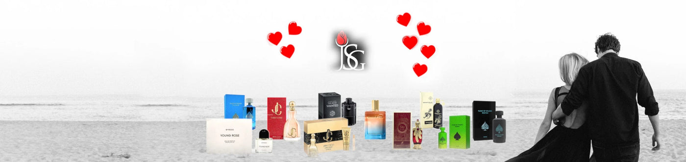 This is a black and white image of a couple walking on the beach. They are walking away from the camera toward the water. On the foreground, there is a promotion for a Valentine's Day Perfumes promotion at with up to 25% off discounts. Some perfumes listed for the available Valentine's Day discounts are Azzaro, Byredo, Jimmy Choo, Jo Milano, Montale, and Michael Malul.